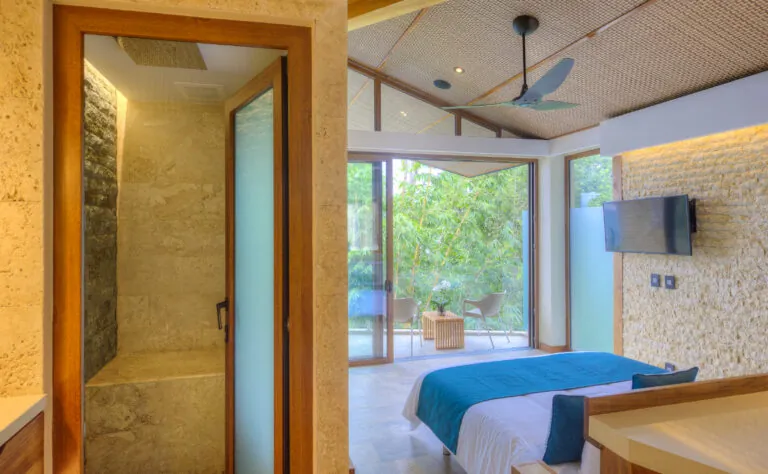 Luxury bedroom suite with private balcony and rainforest views at Villa Punto de Vista, Costa Rica